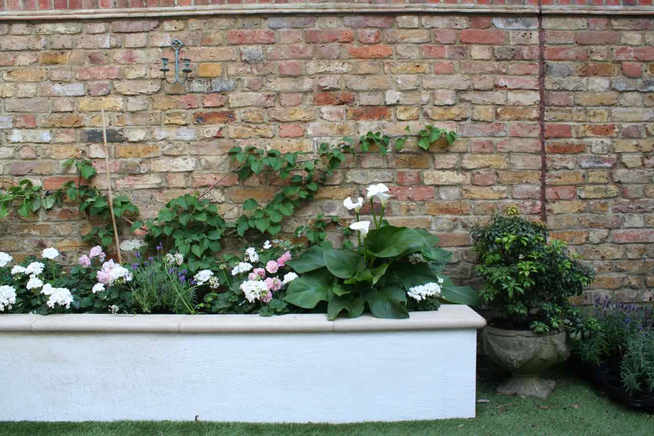 A raised, brick flower bed - perfect for bordering your urban garden